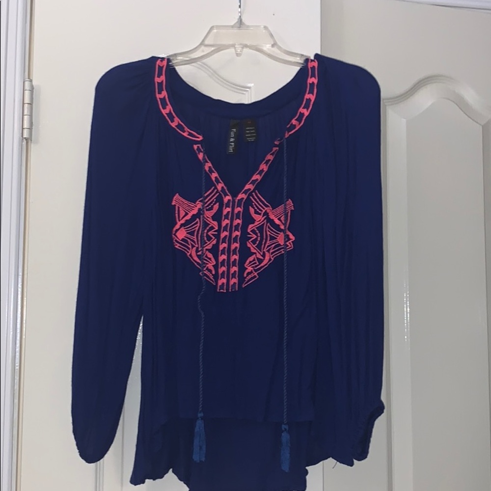 Dark blue shirt with pink embroidery
